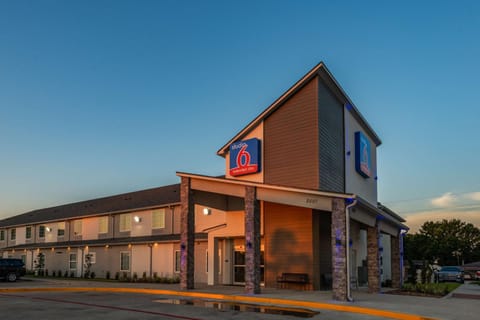 Property building, Facade/entrance, Property logo or sign, On site, Time of day, Sunset