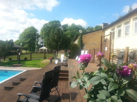 Property building, Patio, Pool view, Swimming pool, Swimming pool