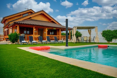 Property building, Patio, Spring, Day, Garden, Garden view, Pool view, Swimming pool, Swimming pool, sunbed