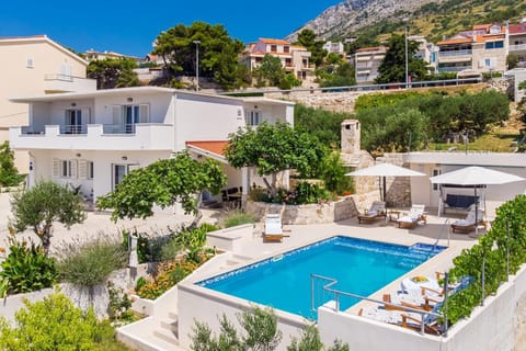 Property building, BBQ facilities, Garden, Balcony/Terrace, Seating area, Swimming pool