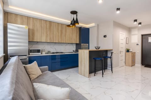 Kitchen or kitchenette, Living room, Seating area, Dining area