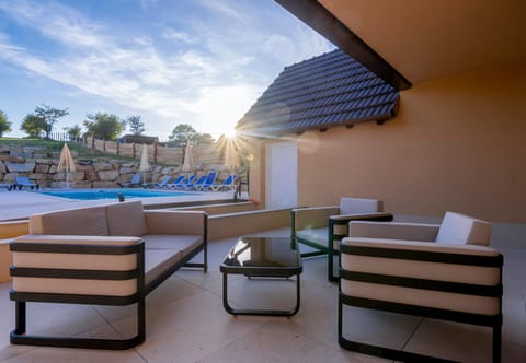Patio, Seating area, Pool view, Swimming pool, sunbed
