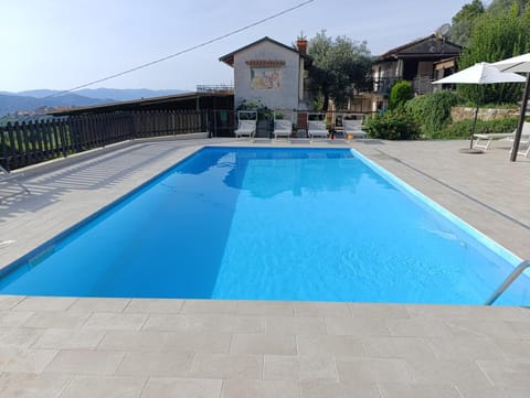 Property building, Day, Natural landscape, Mountain view, Pool view, Swimming pool, sunbed