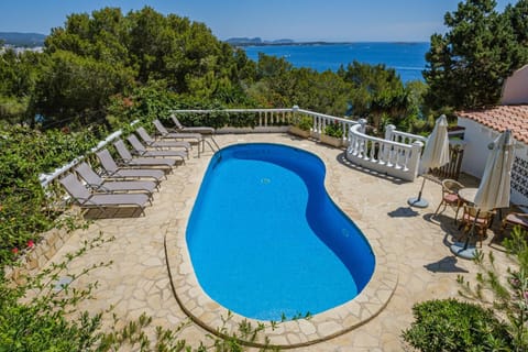 Property building, Living room, Swimming pool
