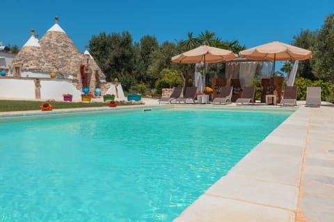 Property building, Living room, Swimming pool