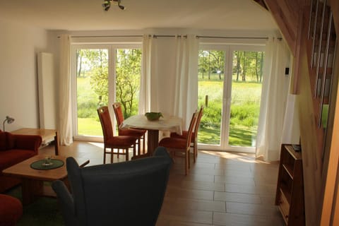 Living room, Seating area, Dining area, Garden view