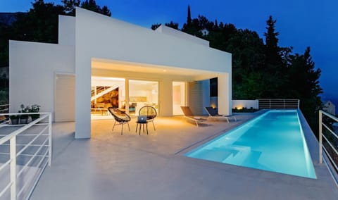 Property building, BBQ facilities, Balcony/Terrace, Seating area, Sea view, Swimming pool