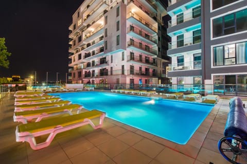 Property building, Night, Pool view, Swimming pool, sunbed