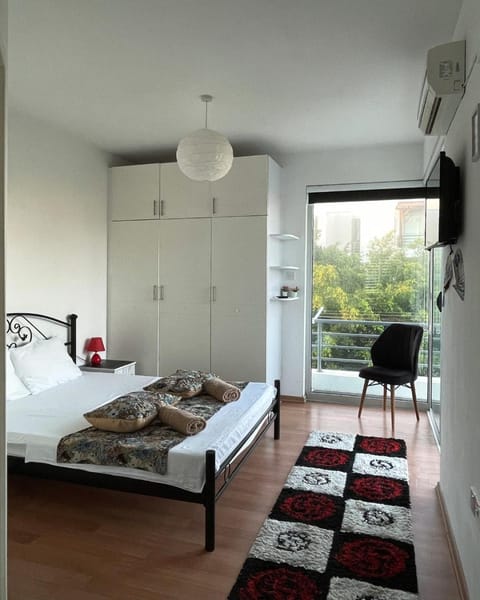 Bed, TV and multimedia, Bedroom, towels, wardrobe, air conditioner