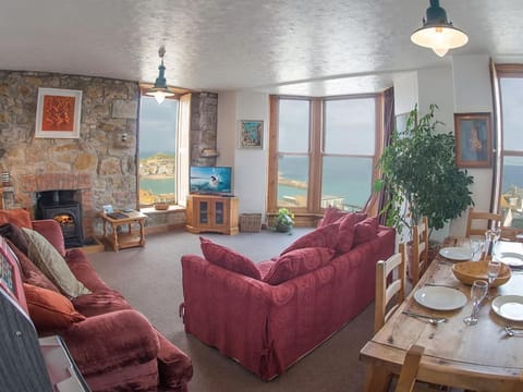 TV and multimedia, View (from property/room), Living room, Photo of the whole room, Dining area, Sea view, fireplace