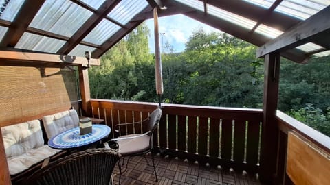 View (from property/room), Balcony/Terrace, Seating area, Garden view