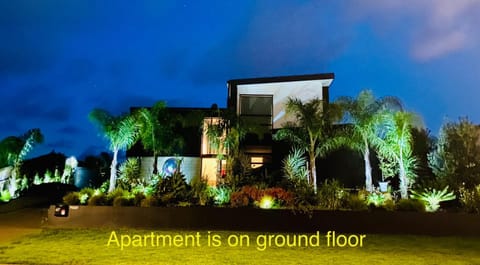 Property building, Night, Garden, Text overlay