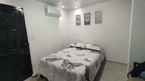 Bed, Photo of the whole room, Bedroom, towels, air conditioner