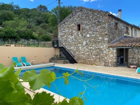 Property building, Patio, Pool view, Swimming pool, sunbed