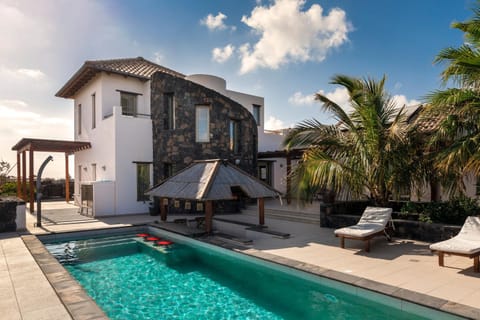 Property building, Living room, Swimming pool
