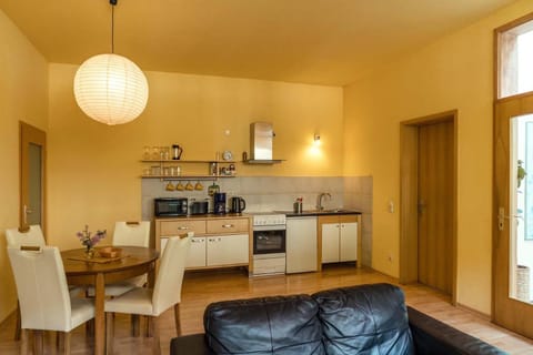 Kitchen or kitchenette, Living room, Seating area, Dining area