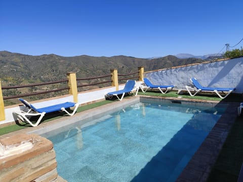 Property building, Living room, Swimming pool