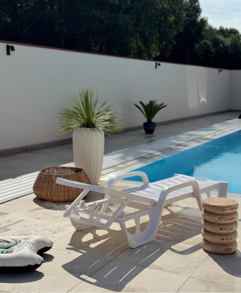 Swimming pool, sunbed