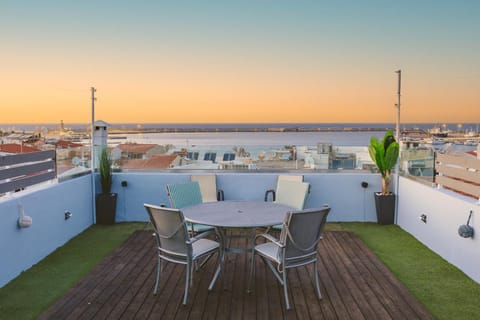 Property building, Patio, Day, Natural landscape, View (from property/room), Balcony/Terrace, Living room, Seating area, Dining area, City view, Sea view