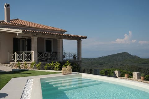 Property building, Day, Natural landscape, Pool view, Swimming pool, sunbed