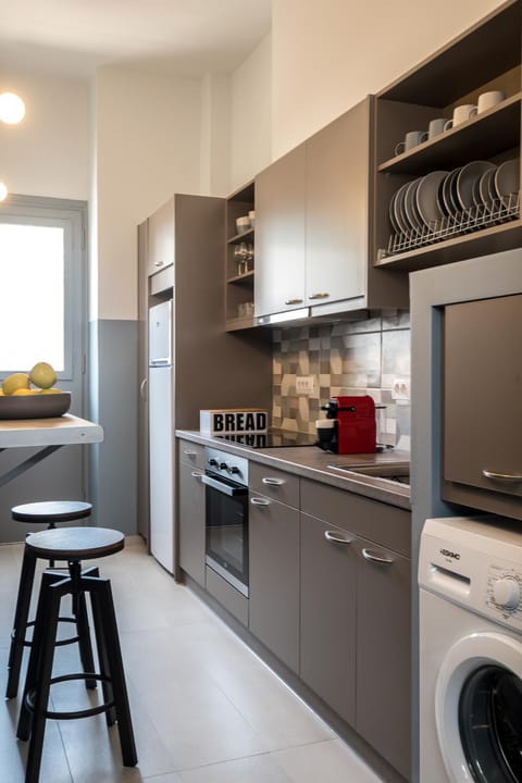 Kitchen or kitchenette, oven, stove, toaster