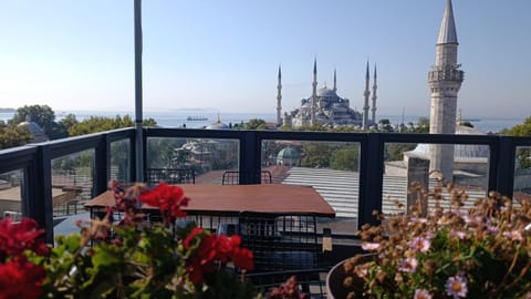 Property building, Patio, Balcony/Terrace, Breakfast, Buffet breakfast