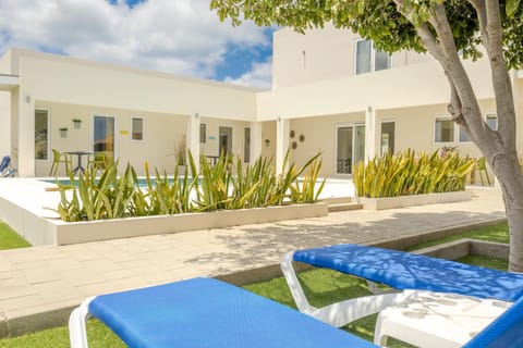 Property building, Patio, Garden, Garden view, sunbed