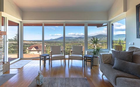 Living room, Seating area, Mountain view, Mountain view, flat iron