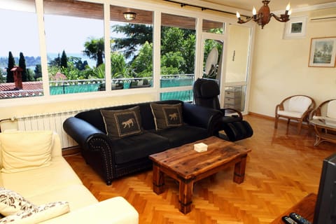 Living room, Seating area, City view, Sea view