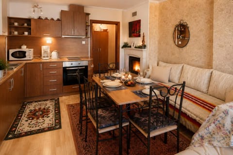 Living room, fireplace, kitchen