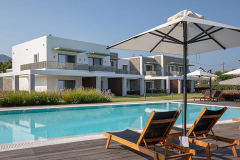 Property building, Pool view, Swimming pool, sunbed