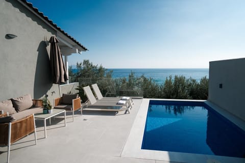 Patio, Day, View (from property/room), Balcony/Terrace, Seating area, Pool view, Sea view, Swimming pool, sunbed