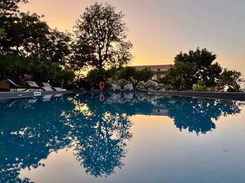 Natural landscape, Pool view, Swimming pool, Sunset, sunbed