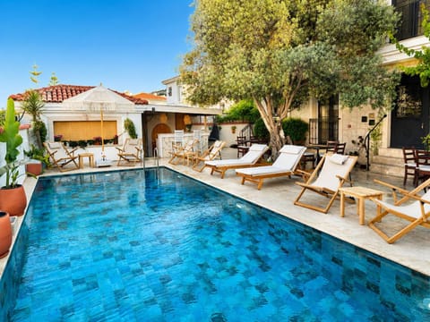 Property building, Day, Pool view, sunbed