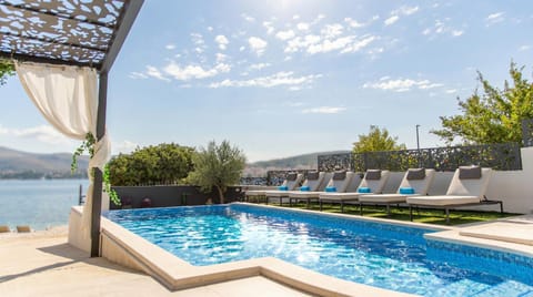 Patio, Day, Natural landscape, View (from property/room), Mountain view, Pool view, Sea view, Swimming pool, Time of day, Inner courtyard view, sunbed, towels