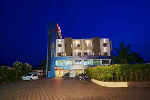 Property building, Nearby landmark, Night, Parking
