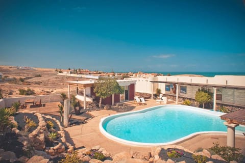 Property building, Patio, Facade/entrance, Bird's eye view, BBQ facilities, Garden, Balcony/Terrace, Garden view, Pool view, Sea view, Swimming pool
