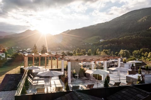 Property building, Natural landscape, Bird's eye view, Balcony/Terrace, Mountain view, Swimming pool, Sunset