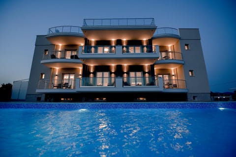 Property building, Night, Pool view, Swimming pool