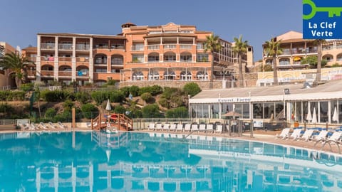 Property building, Day, Pool view, Swimming pool, sunbed