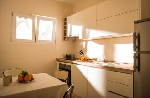 Kitchen or kitchenette, oven, stove