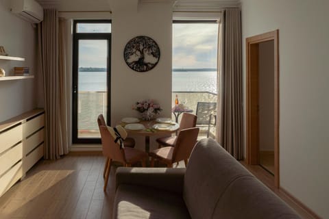 Living room, Dining area, Lake view