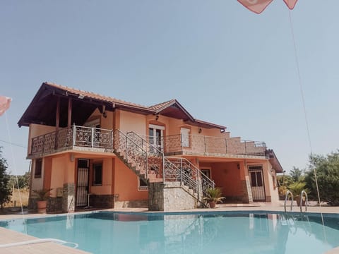 Property building, Swimming pool, Sunset