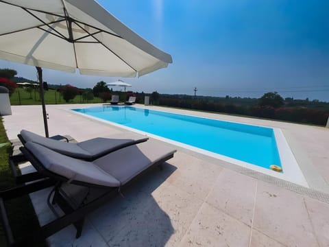 Property building, Living room, Swimming pool