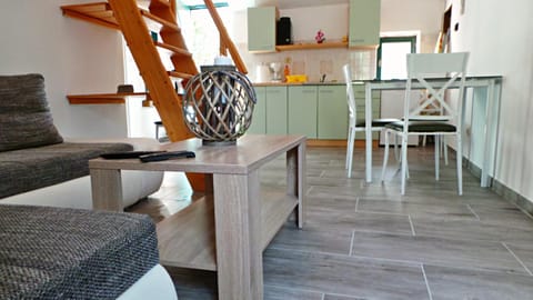 Kitchen or kitchenette, Living room, Seating area, Dining area