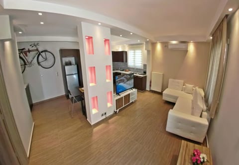 TV and multimedia, Kitchen or kitchenette, Living room, Seating area, Bedroom