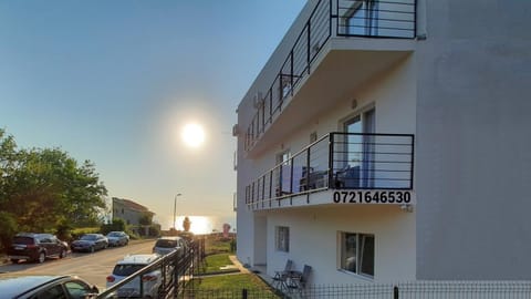 Property building, Facade/entrance, Garden, Sea view, Street view, Sunrise, Parking