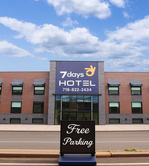 Property building, Day, Property logo or sign, Logo/Certificate/Sign, Text overlay, Street view, Location, Parking