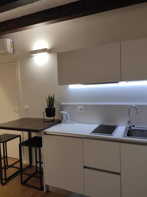 Kitchen or kitchenette, stove