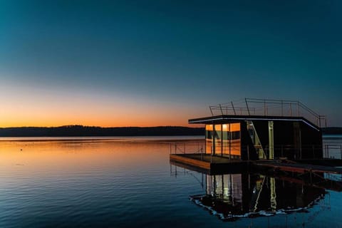 Domy na wodzie Charzykowy Docked boat in Pomeranian Voivodeship